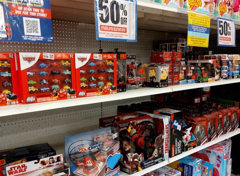 Toy aisle full of name-brand toys at 50% off